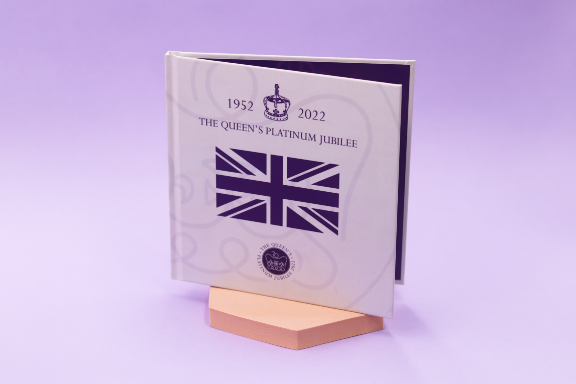 A display showing a printed Commemorative Jubilee Photobook
